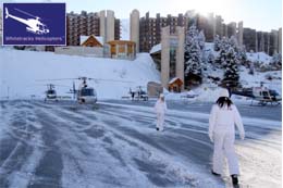 The Whitetracks Snow Bunnies walking to the parked Helicopters to meet the Clients as the doors open