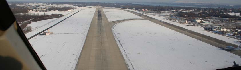 Helicopter Airport Transfers - Picture: Aerial View of Geneva Airport main runway from Helicopter when flying over it to get to the mountains - Geneva Contrin International Airport